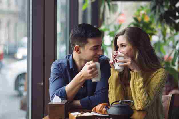 couple-love-drinking-coffee-coffee-shop_158595-1574